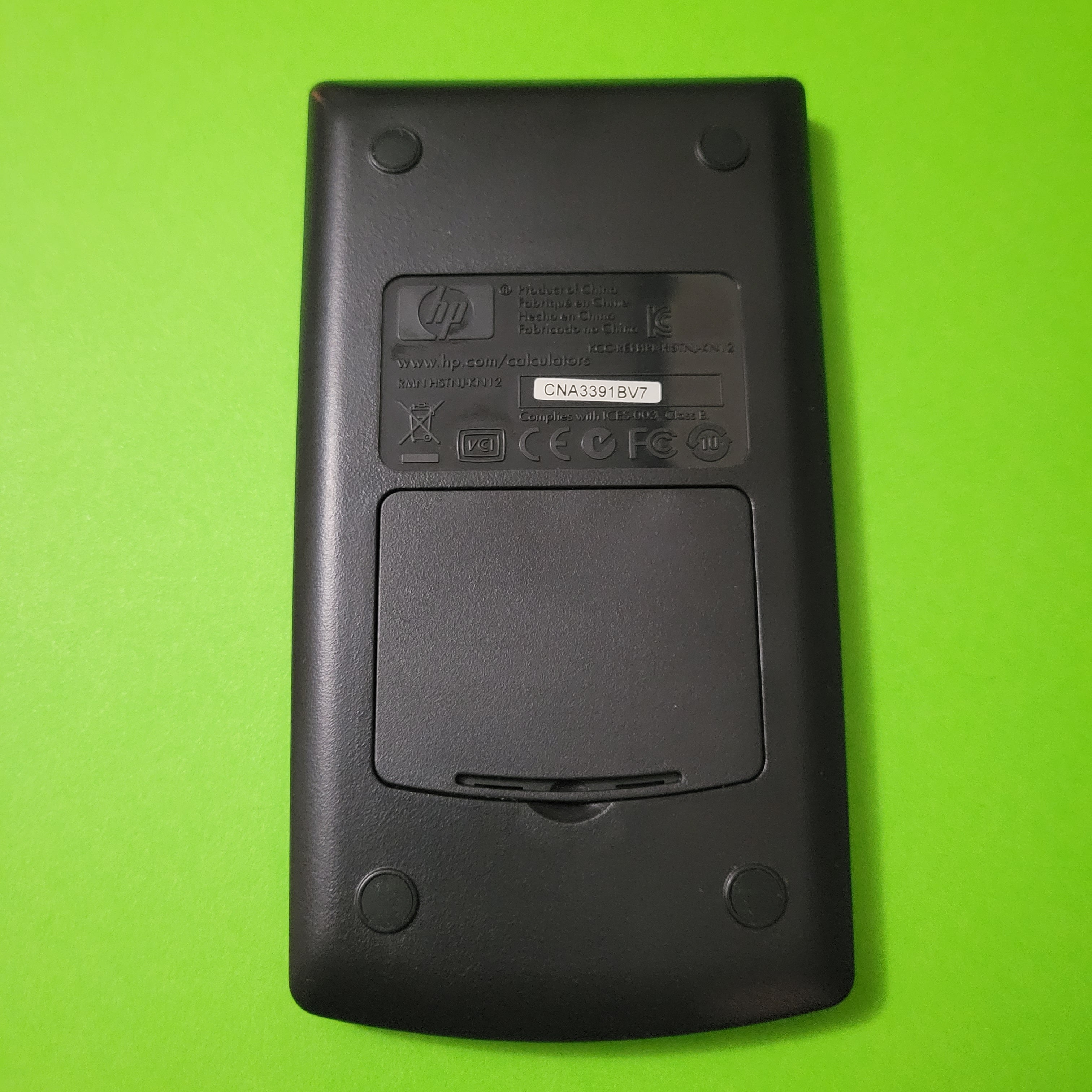 An image of the back of a HP10BII+ financial calulator